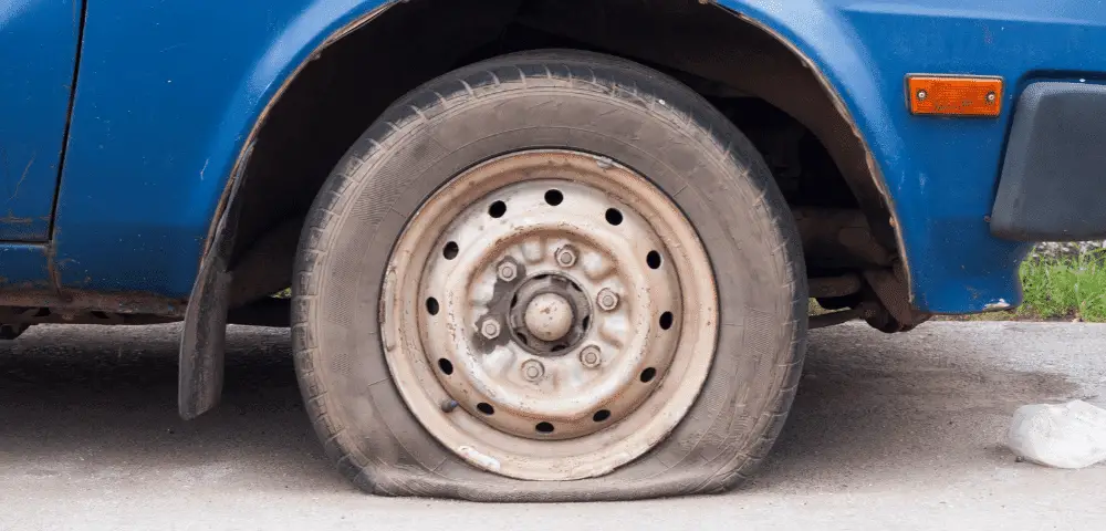 Can I Leave My Car Parked With A Flat Tire, Can I Leave My Car Parked With A Flat Tire? (Answered), KevweAuto