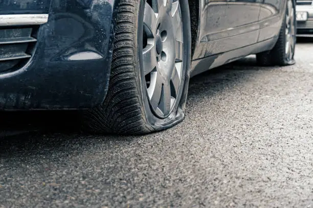 Can I Leave My Car Parked With A Flat Tire, Can I Leave My Car Parked With A Flat Tire? (Answered), KevweAuto